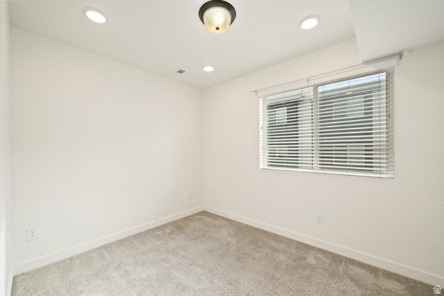 70 East Weekes Way Clearfield, UT 84015 - Photo 13 of 25 Unfurnished room featuring carpet floors and recessed lighting
