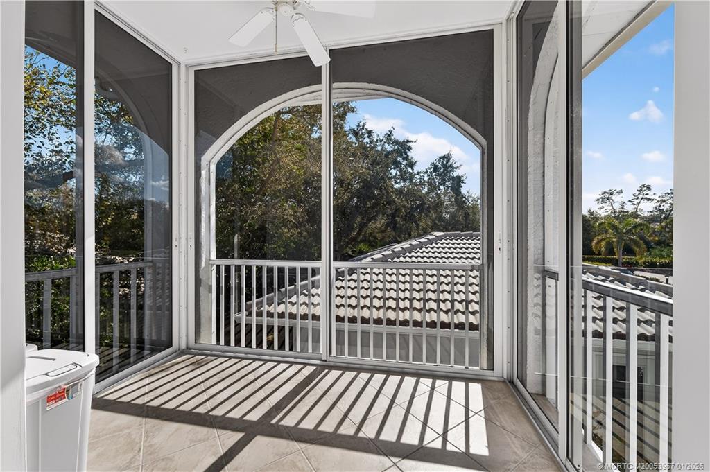 12400 Harbour Ridge Boulevard, Unit 58 Palm City, FL 34990 - Photo 20 of 42 a view of a balcony with wooden floor