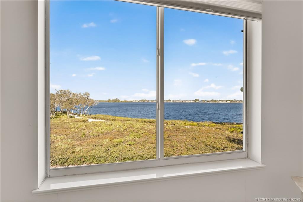 12400 Harbour Ridge Boulevard, Unit 58 Palm City, FL 34990 - Photo 22 of 42 a view of a lake from a window