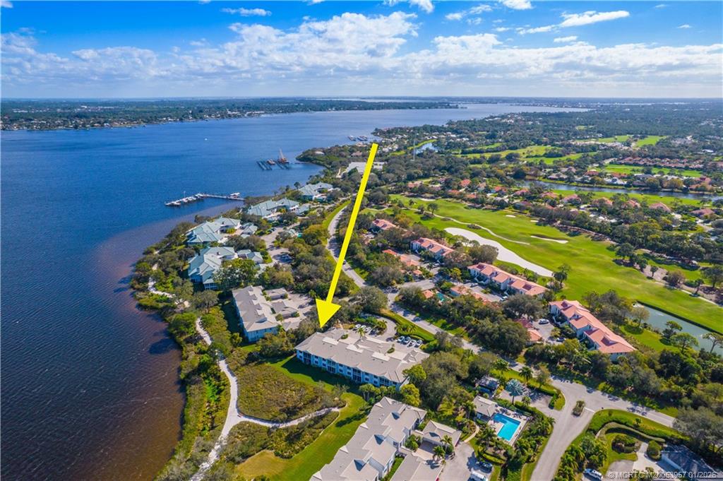 12400 Harbour Ridge Boulevard, Unit 58 Palm City, FL 34990 - Photo 36 of 42 a view of a city with an ocean