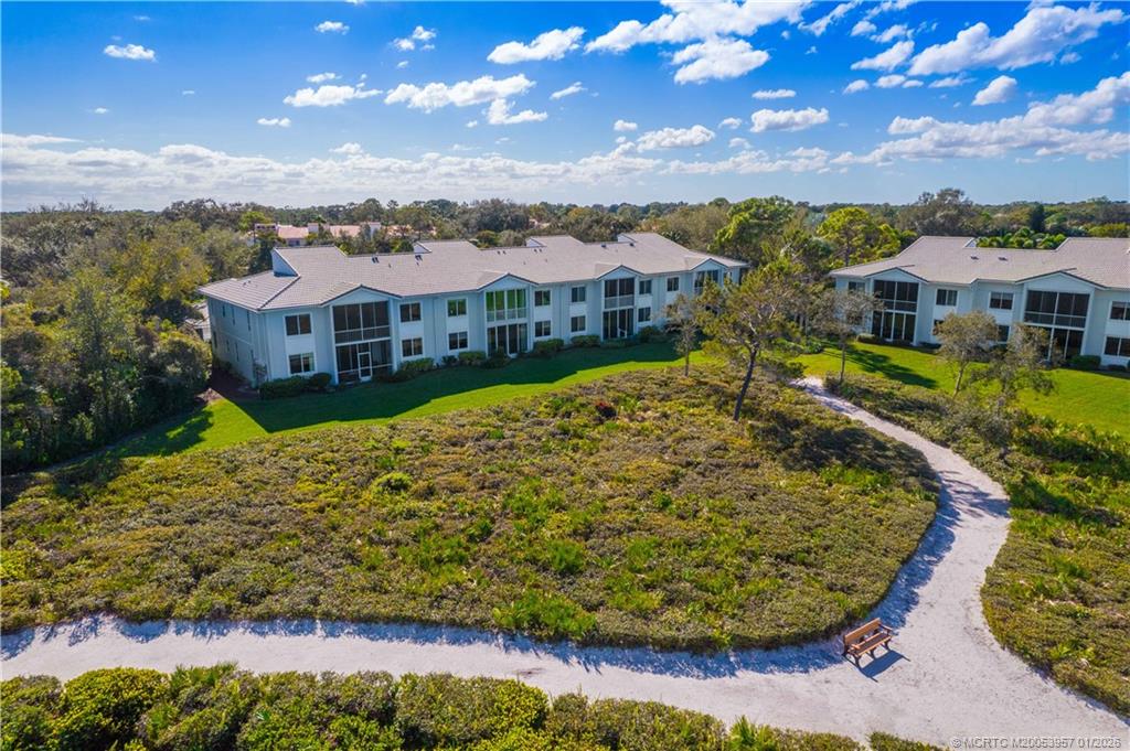 12400 Harbour Ridge Boulevard, Unit 58 Palm City, FL 34990 - Photo 38 of 42 a view of a city with a lake