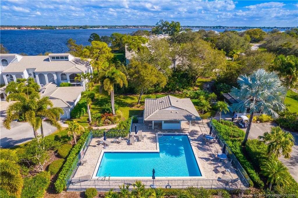 12400 Harbour Ridge Boulevard, Unit 58 Palm City, FL 34990 - Photo 4 of 42 an aerial view of a house with a garden