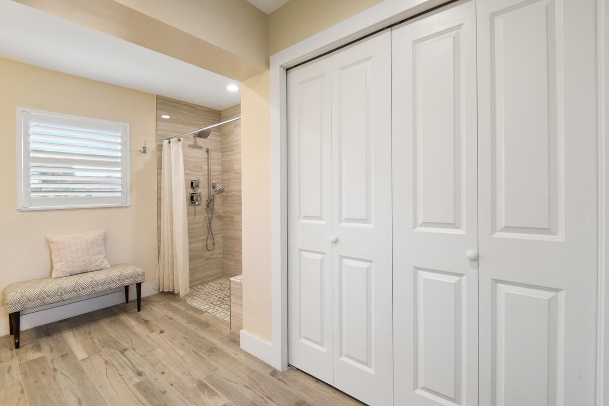 4835 Bimini Road Jupiter, FL 33469 - Photo 24 of 37 a view of a livingroom with furniture and hardwood floor