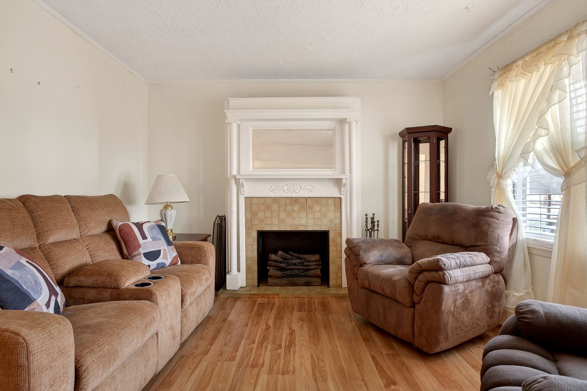 4463 Crisp Springs Road McMinnville, TN 37110 - Photo 3 of 26 a living room with furniture and a fireplace
