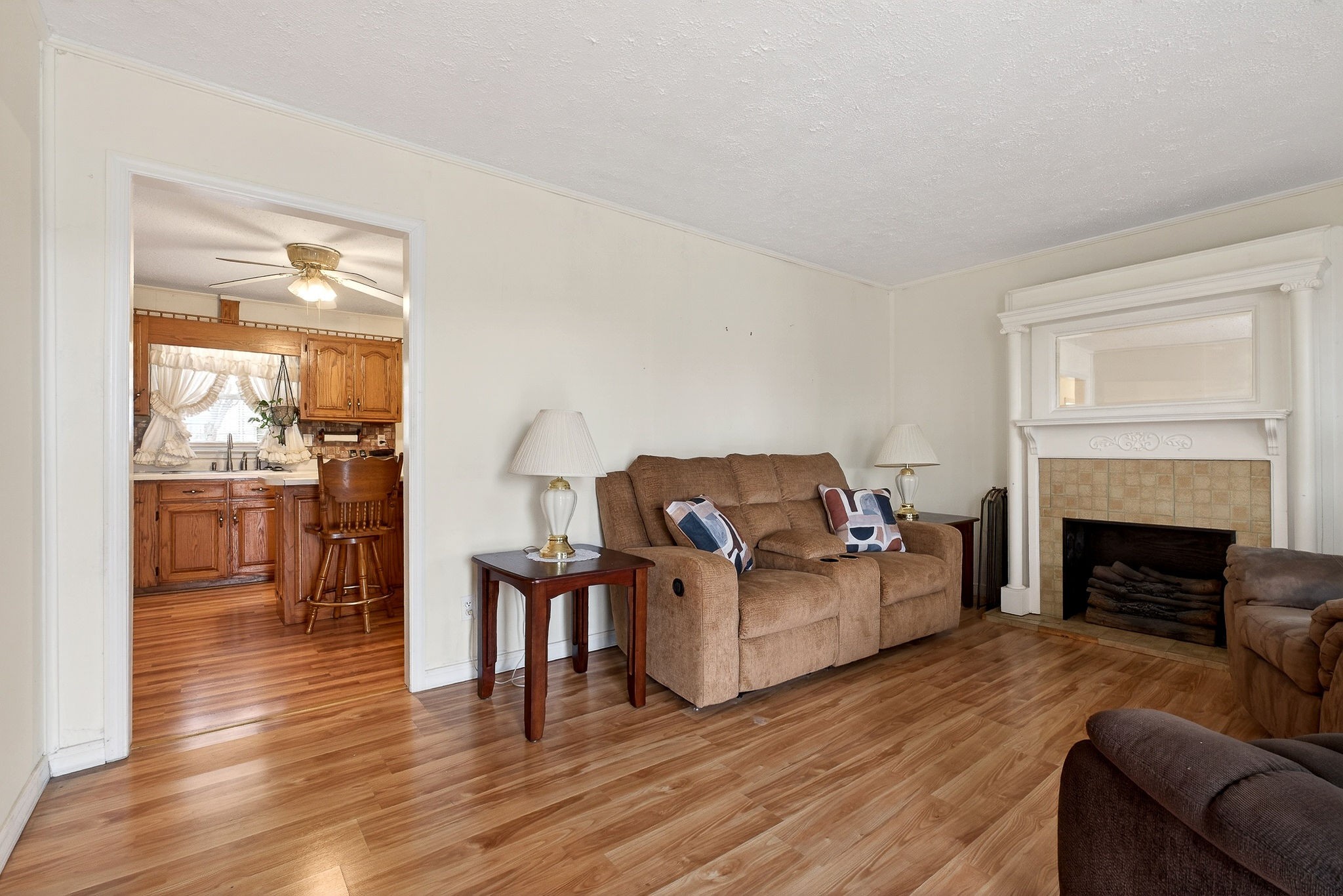 4463 Crisp Springs Road McMinnville, TN 37110 - Photo 5 of 26 a living room with furniture and a fireplace