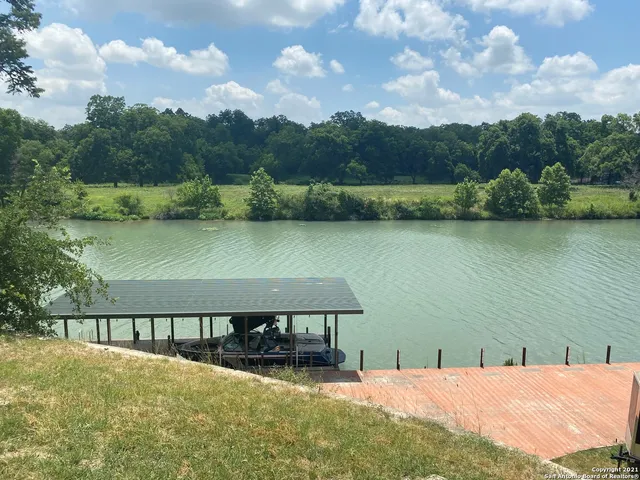 a view of a lake with a mountain in the background