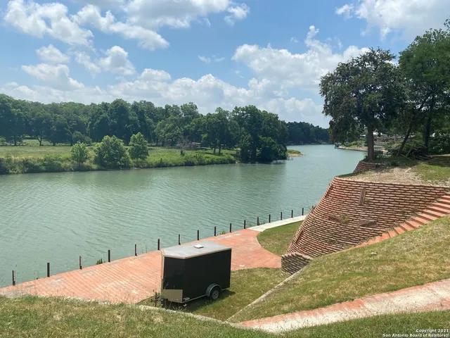 a view of a lake from a yard