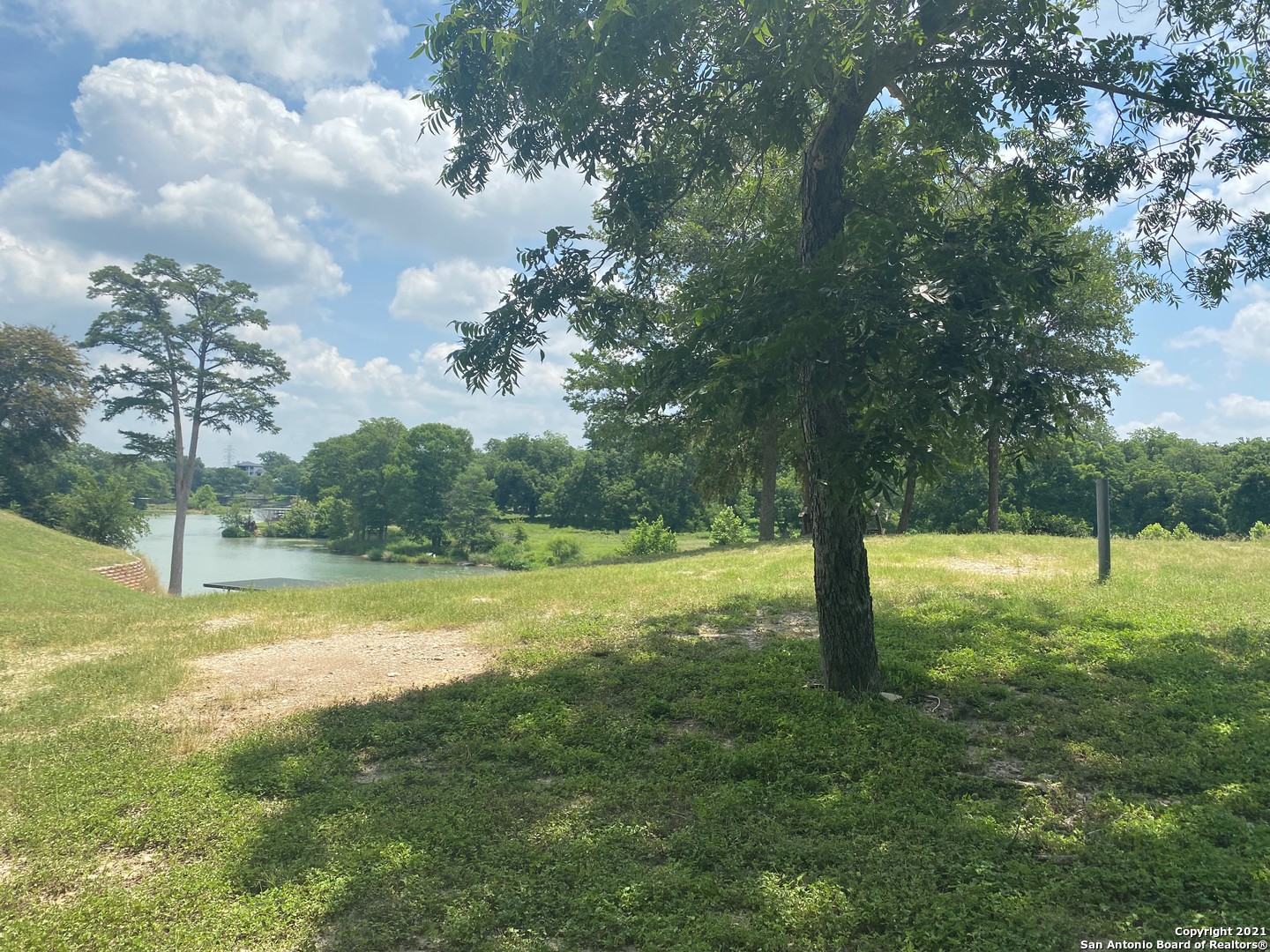 585-591 Vista Del Rio New Braunfels, TX 78130 - Photo 7 of 12 a view of a yard with a tree