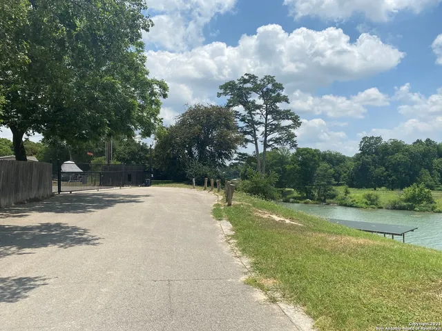 a view of a backyard of the house