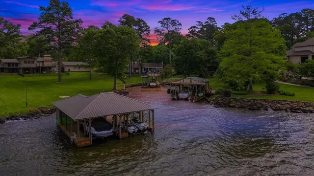a view of a backyard with sitting area