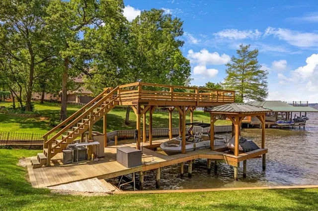 a view of a swimming pool with chairs