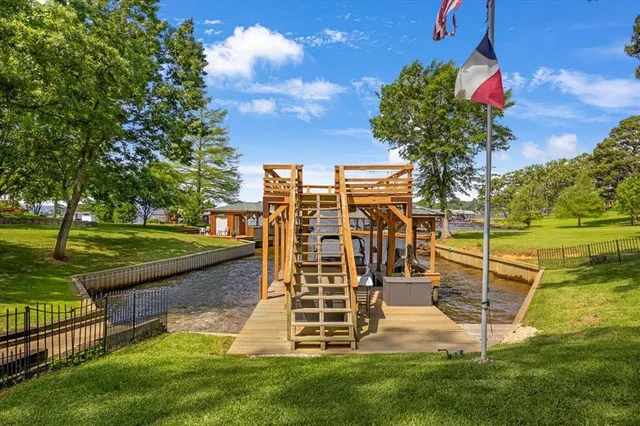 a view of a backyard with sitting area
