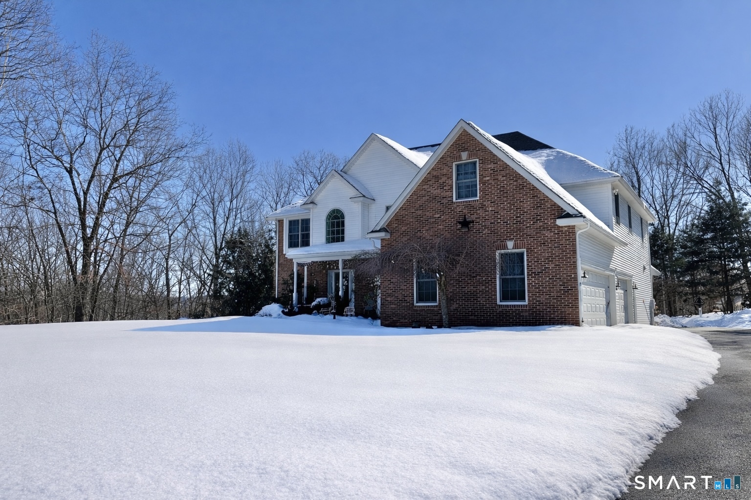 45 North Gate Road Woodbury, CT 06798 - Photo 1 of 40 a front view of a house with a yard
