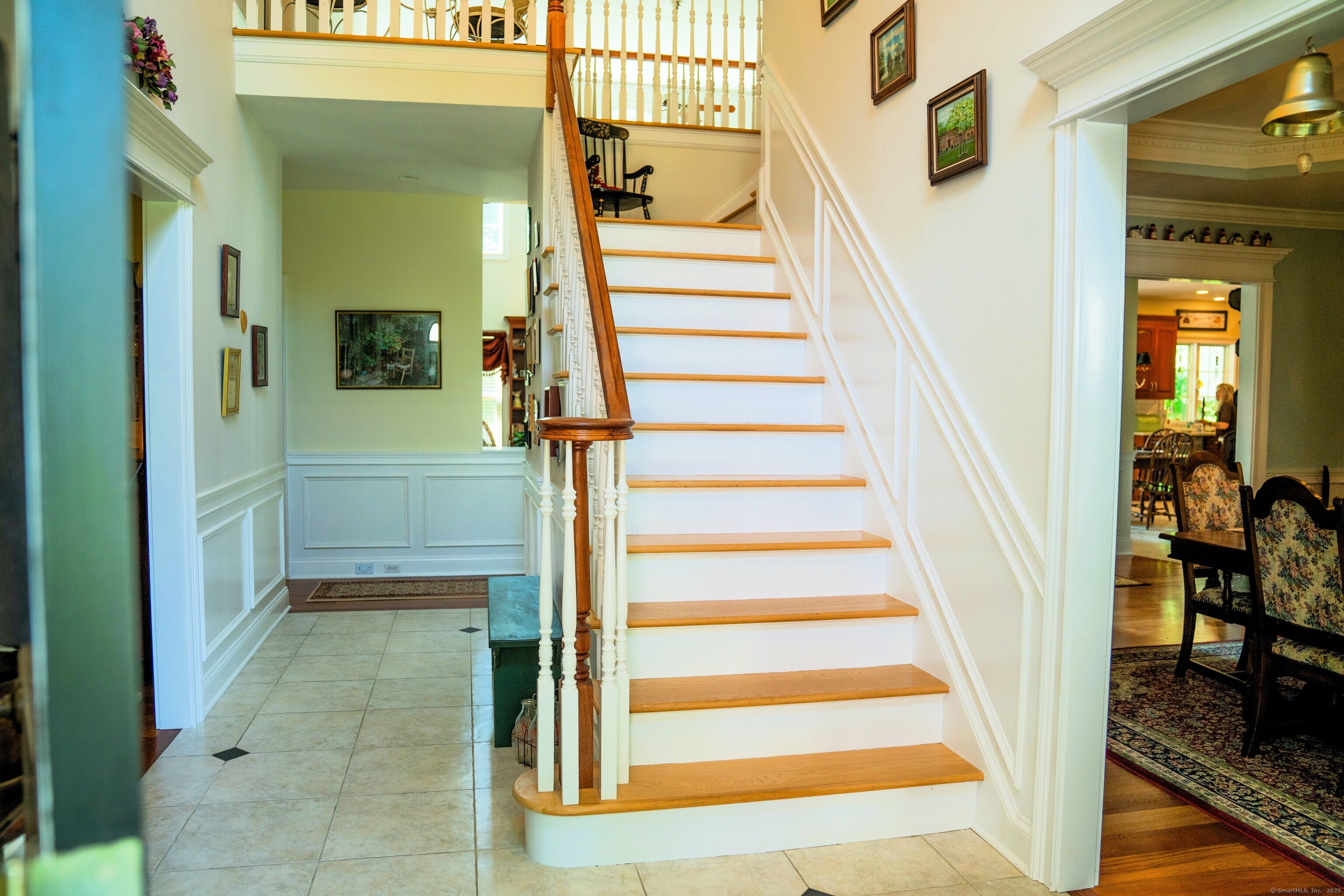45 North Gate Road Woodbury, CT 06798 - Photo 15 of 40 a view of a staircase and a living room