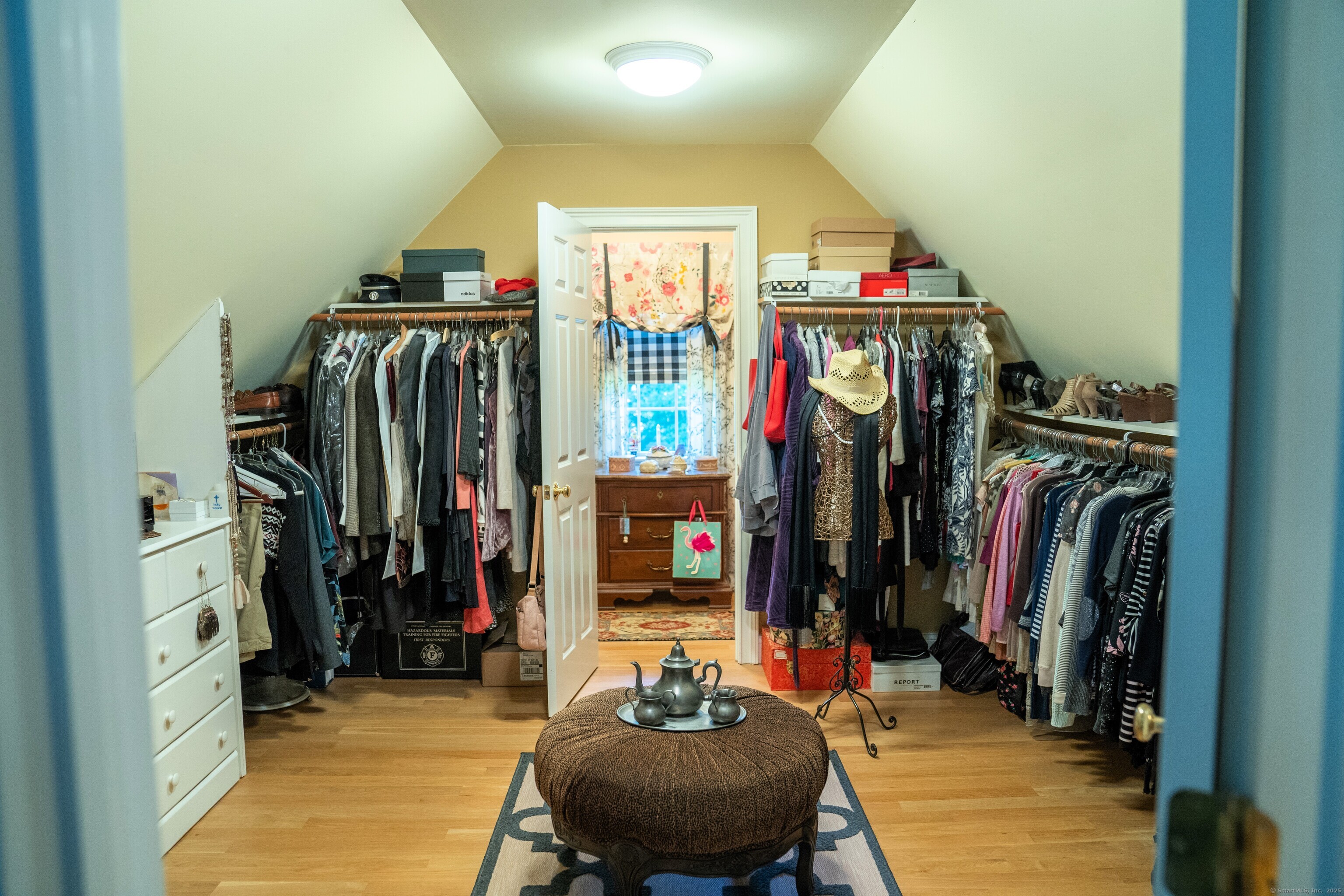 45 North Gate Road Woodbury, CT 06798 - Photo 23 of 40 a view of walk in closet with clothes