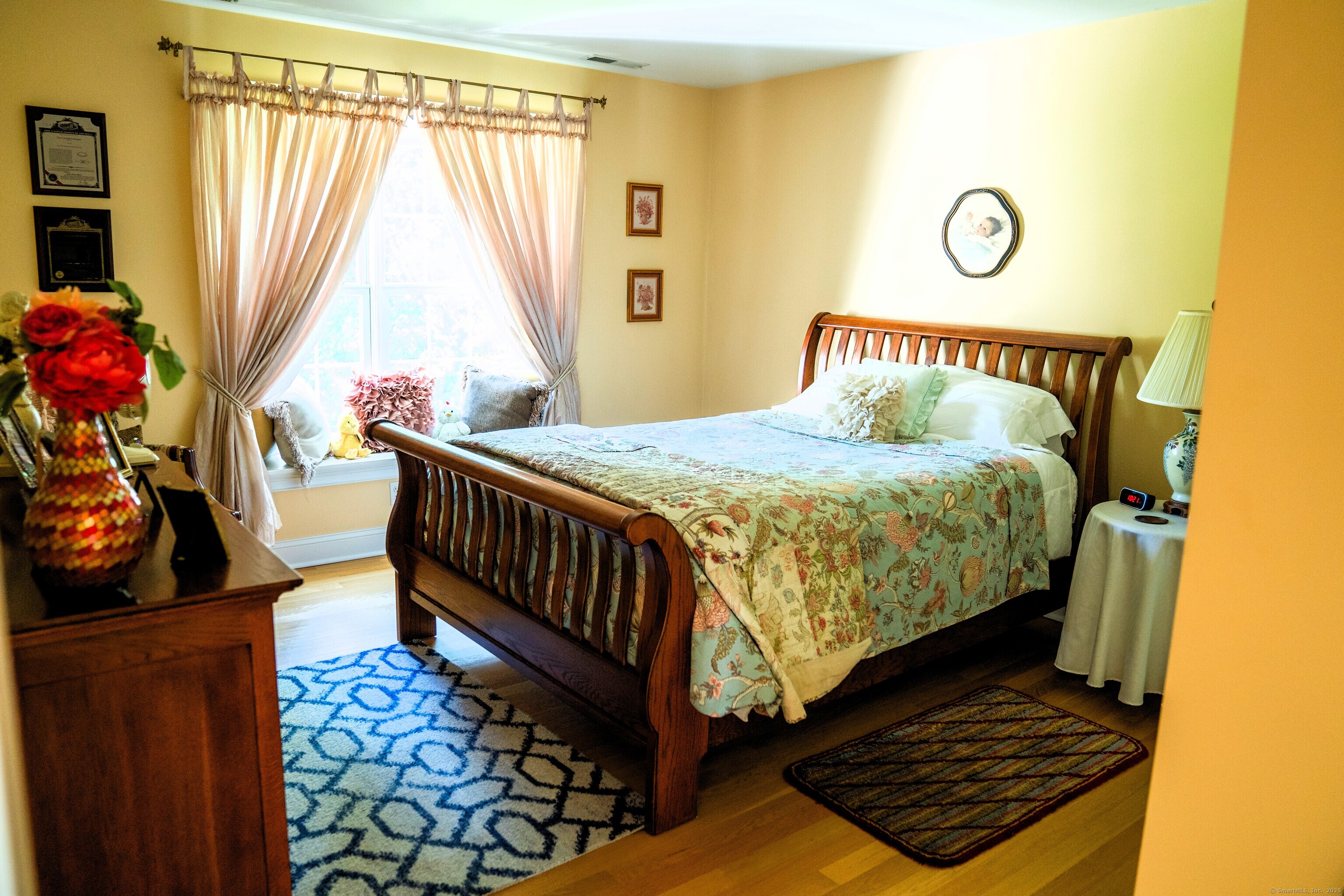 45 North Gate Road Woodbury, CT 06798 - Photo 26 of 40 a bedroom with a bed and a window