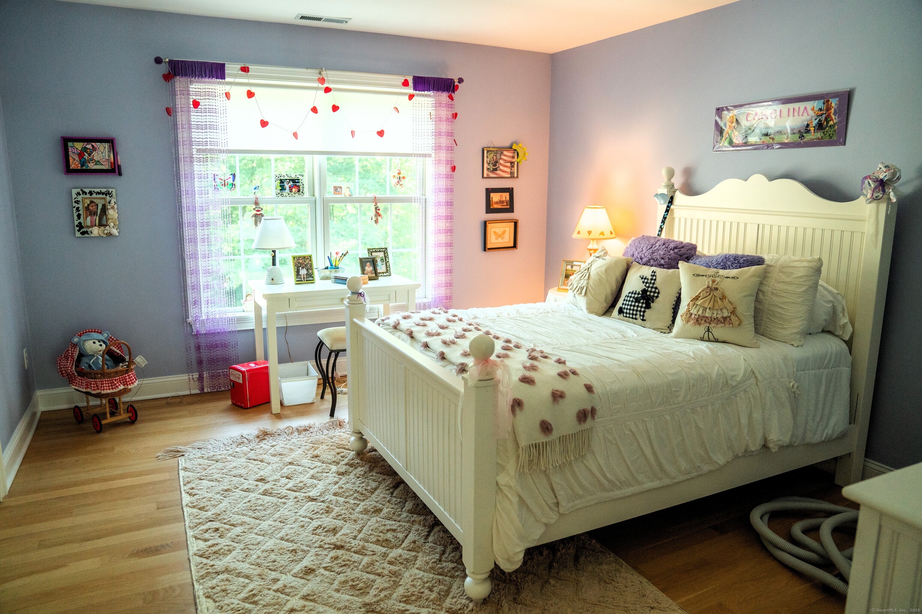 45 North Gate Road Woodbury, CT 06798 - Photo 28 of 40 a bedroom with a bed and wooden floor