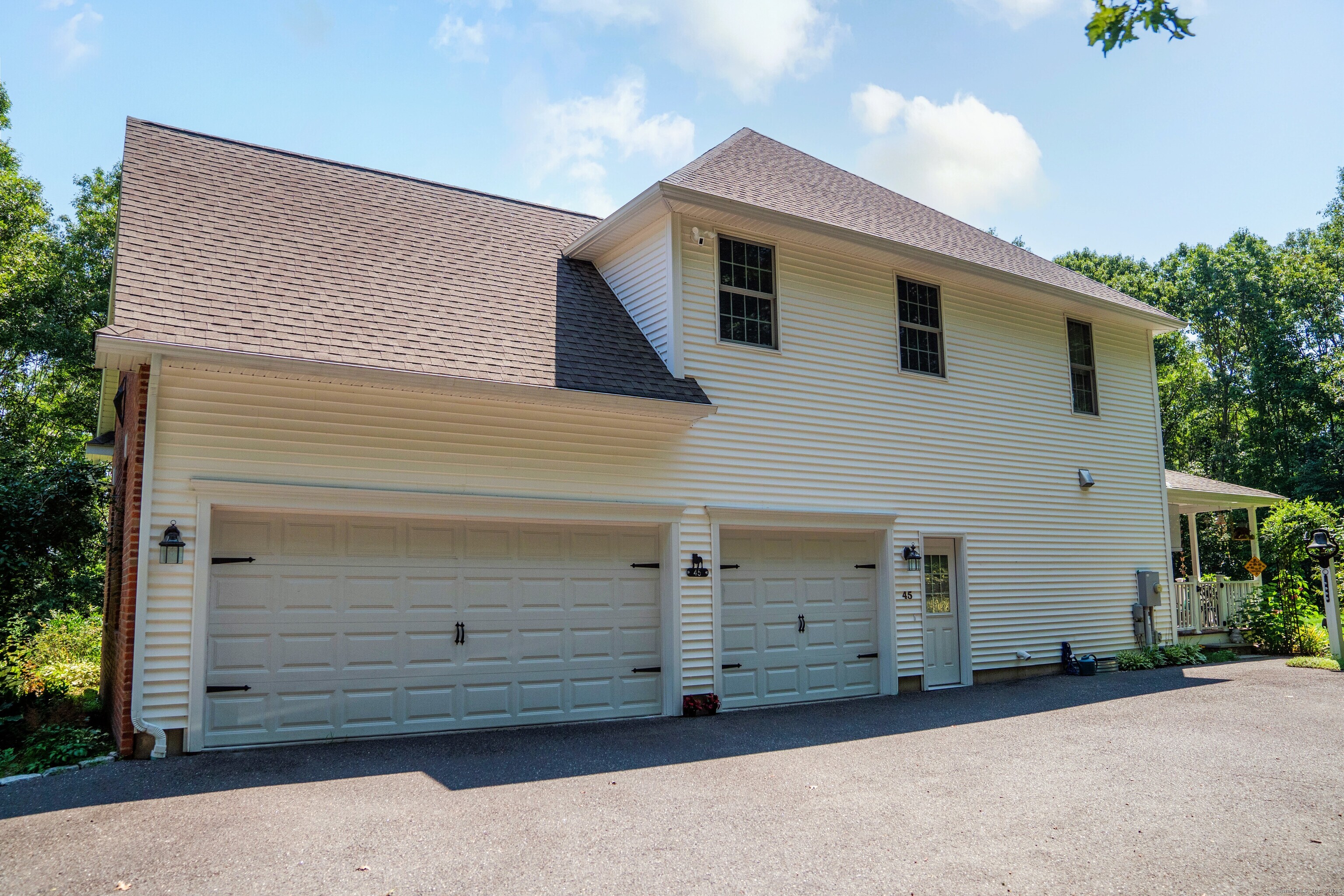 45 North Gate Road Woodbury, CT 06798 - Photo 35 of 40 a view of a house with a garage