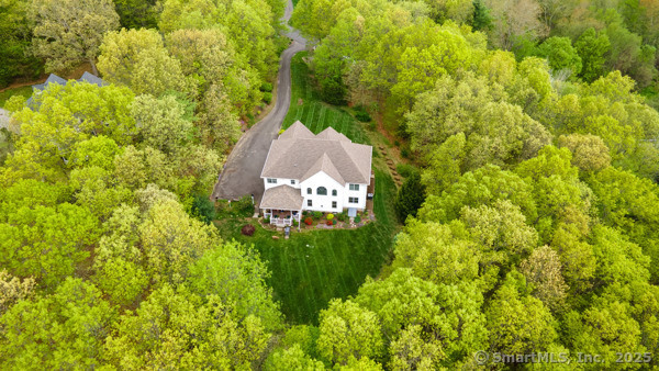 45 North Gate Road Woodbury, CT 06798 - Photo 40 of 40 a view of a house with a yard