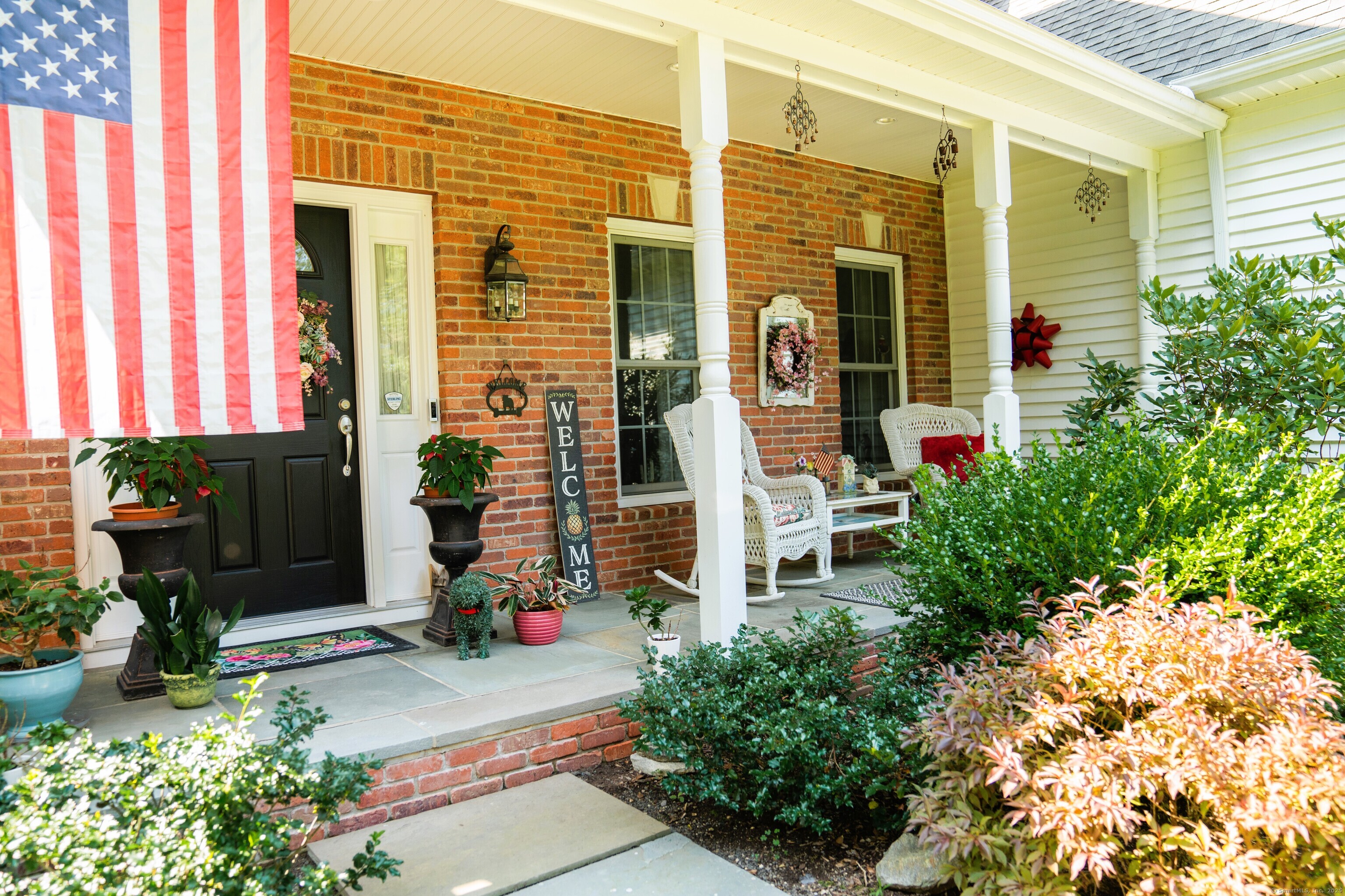 45 North Gate Road Woodbury, CT 06798 - Photo 4 of 40 a front view of a house with a yard