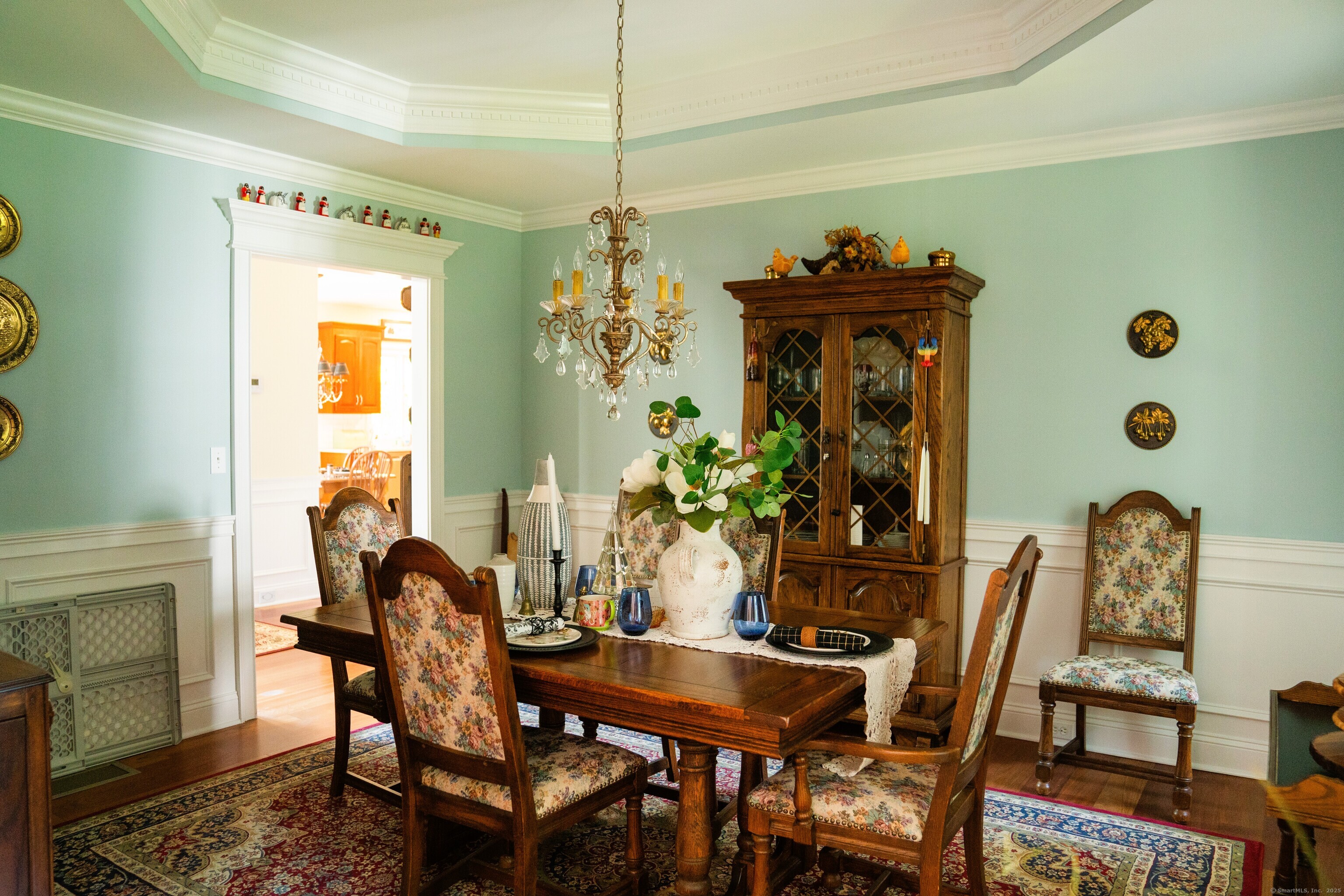 45 North Gate Road Woodbury, CT 06798 - Photo 5 of 40 a view of a dining room with furniture and chandelier