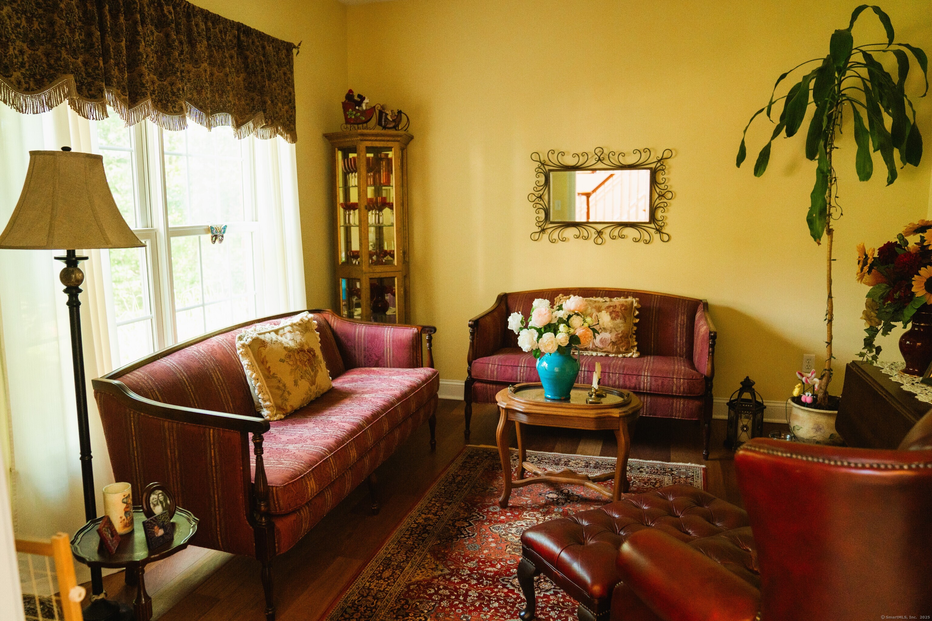 45 North Gate Road Woodbury, CT 06798 - Photo 7 of 40 a living room with furniture and a window