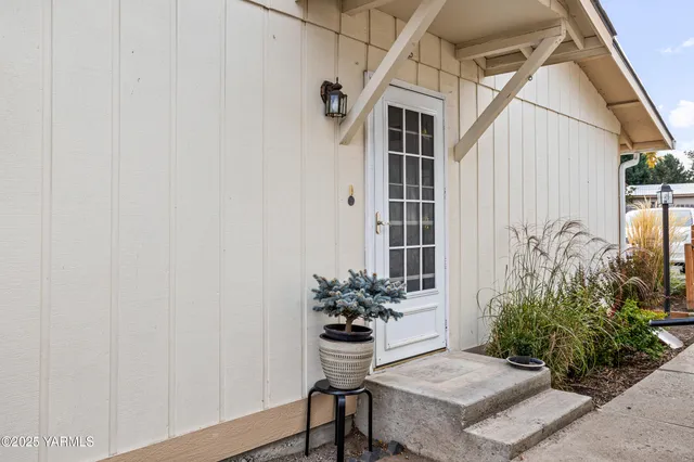 a house view with a potted plant
