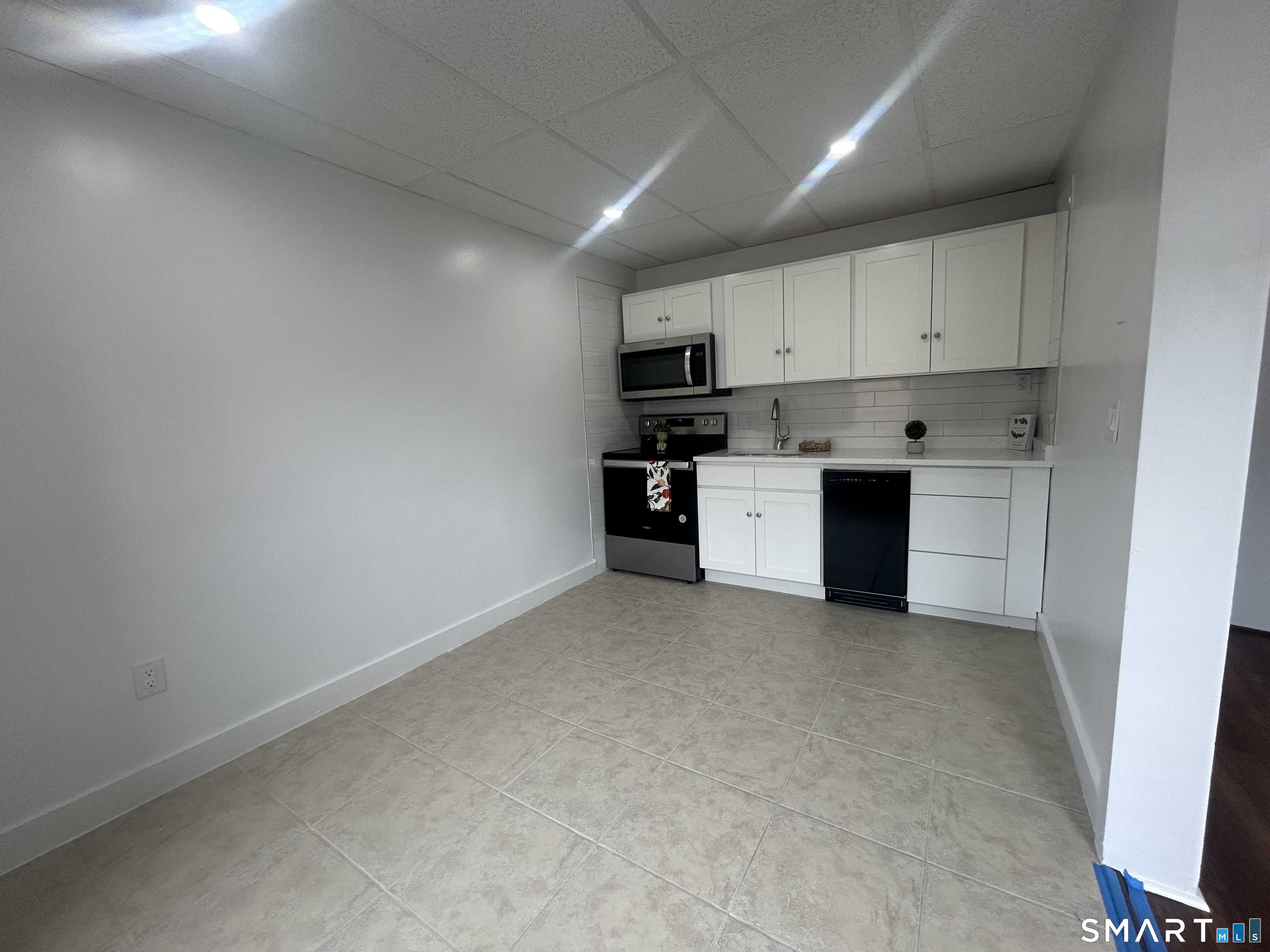 156 Garfield Avenue New London, CT 06320 - Photo 1 of 10 a view of a kitchen with a sink