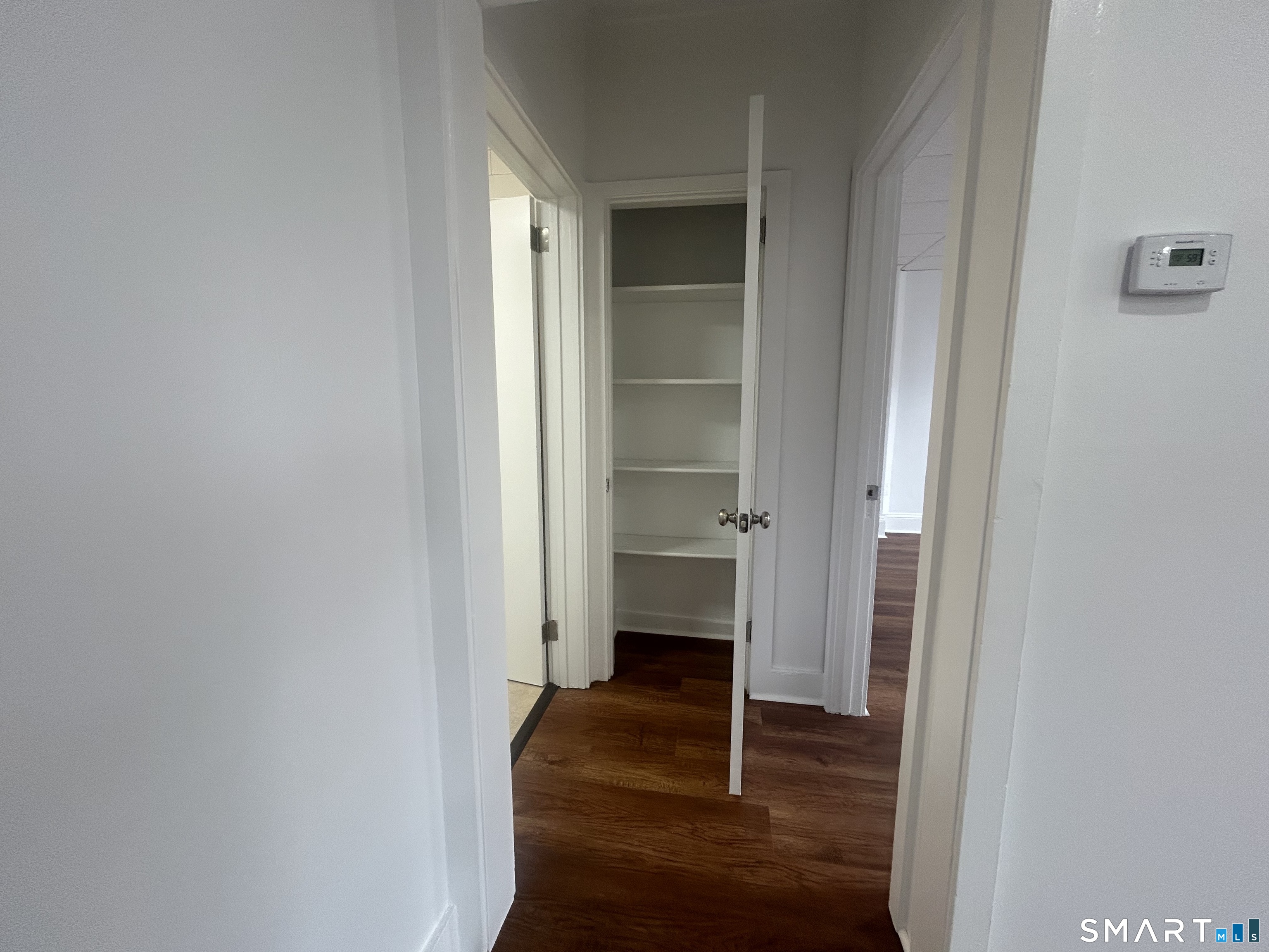156 Garfield Avenue New London, CT 06320 - Photo 7 of 10 a view of entryway and hall with wooden floor