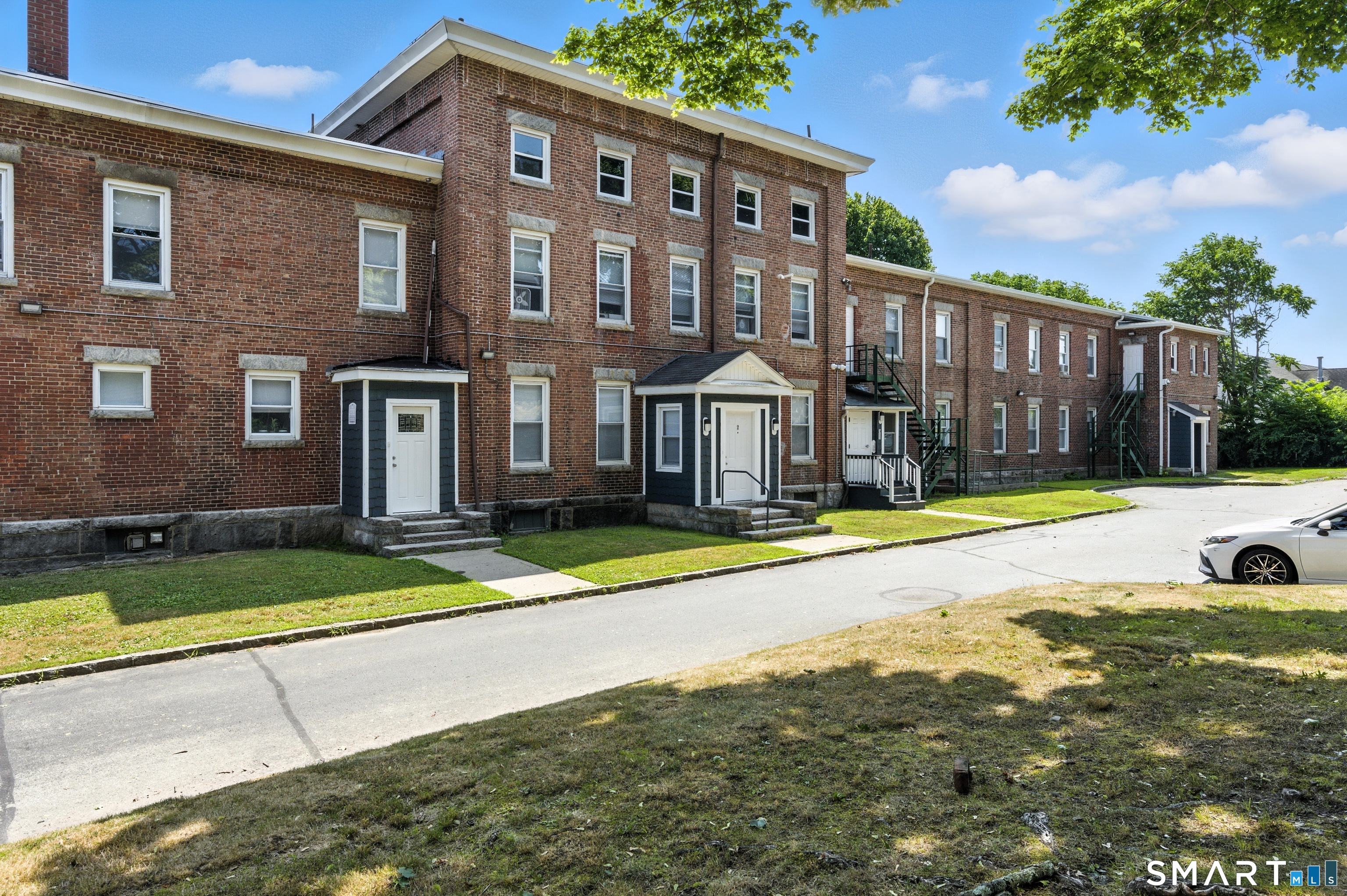 156 Garfield Avenue New London, CT 06320 - Photo 9 of 10 a view of a house with swimming pool and a yard