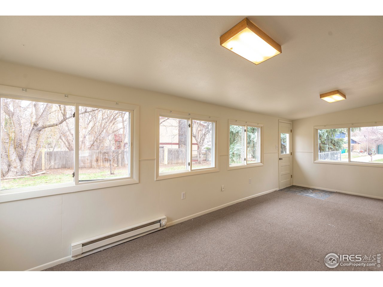 2652 Avocet Road Fort Collins, CO 80526 - Photo 37 of 39 sunroom