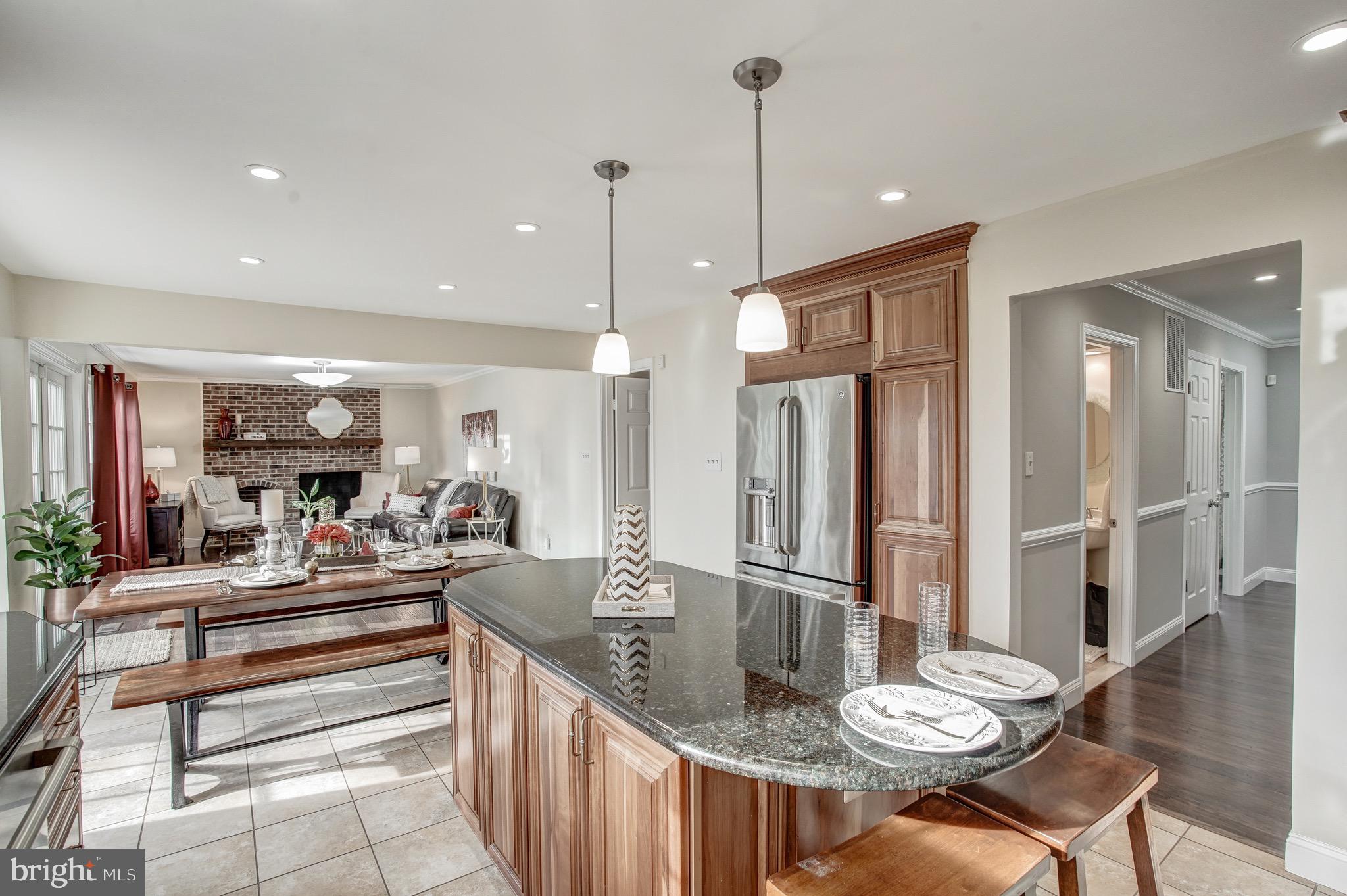 6831 Bluecurl Circle Springfield, VA 22152 - Photo 15 of 50 Featuring high end GE stainless appliances