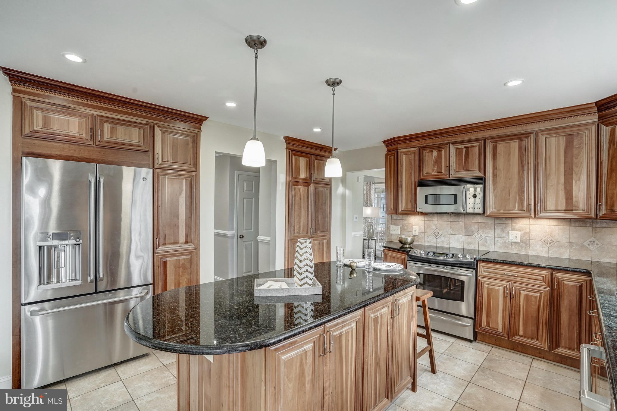 6831 Bluecurl Circle Springfield, VA 22152 - Photo 17 of 50 With a large island