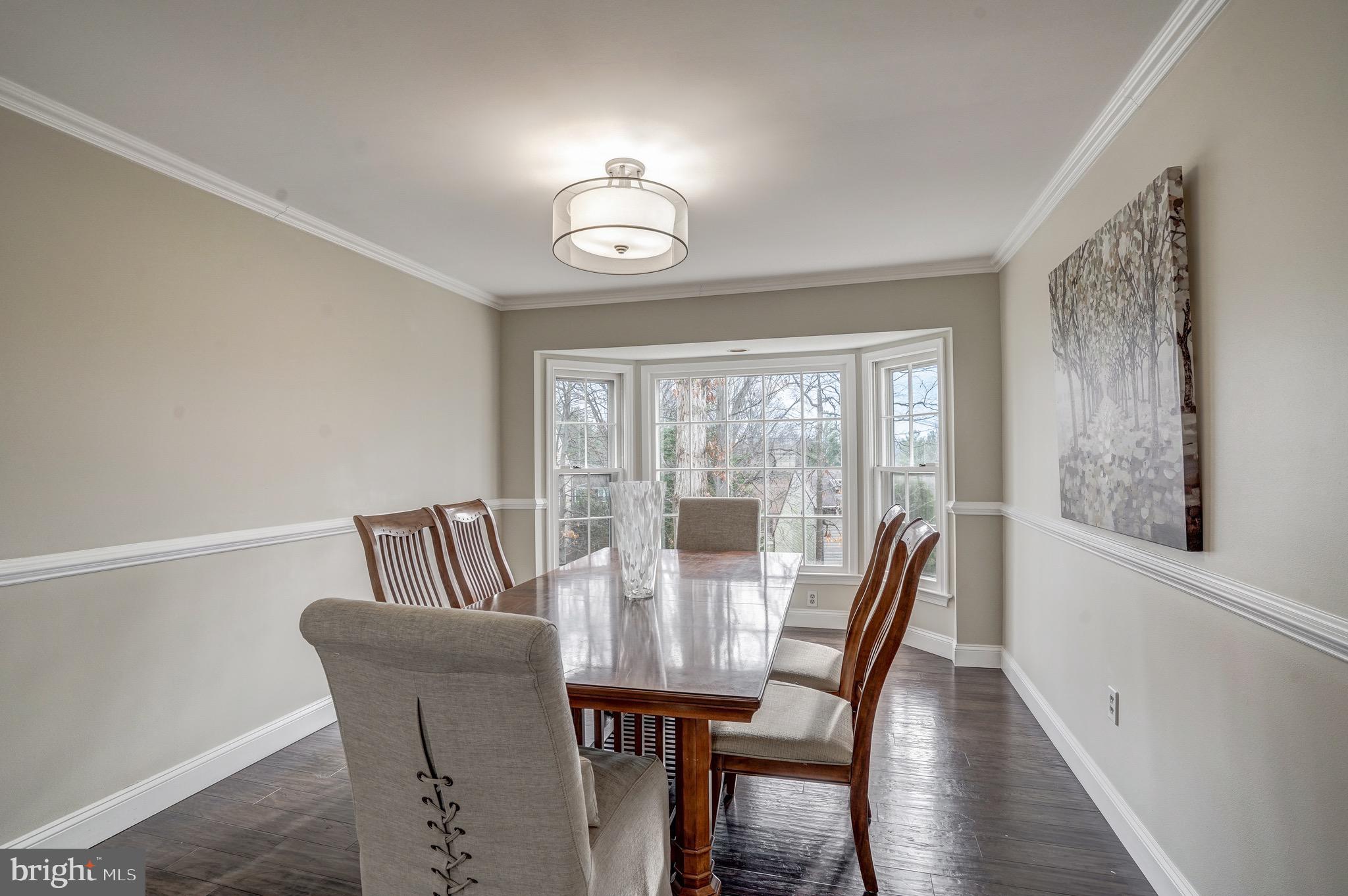 6831 Bluecurl Circle Springfield, VA 22152 - Photo 22 of 50 The dining room and family room are all open