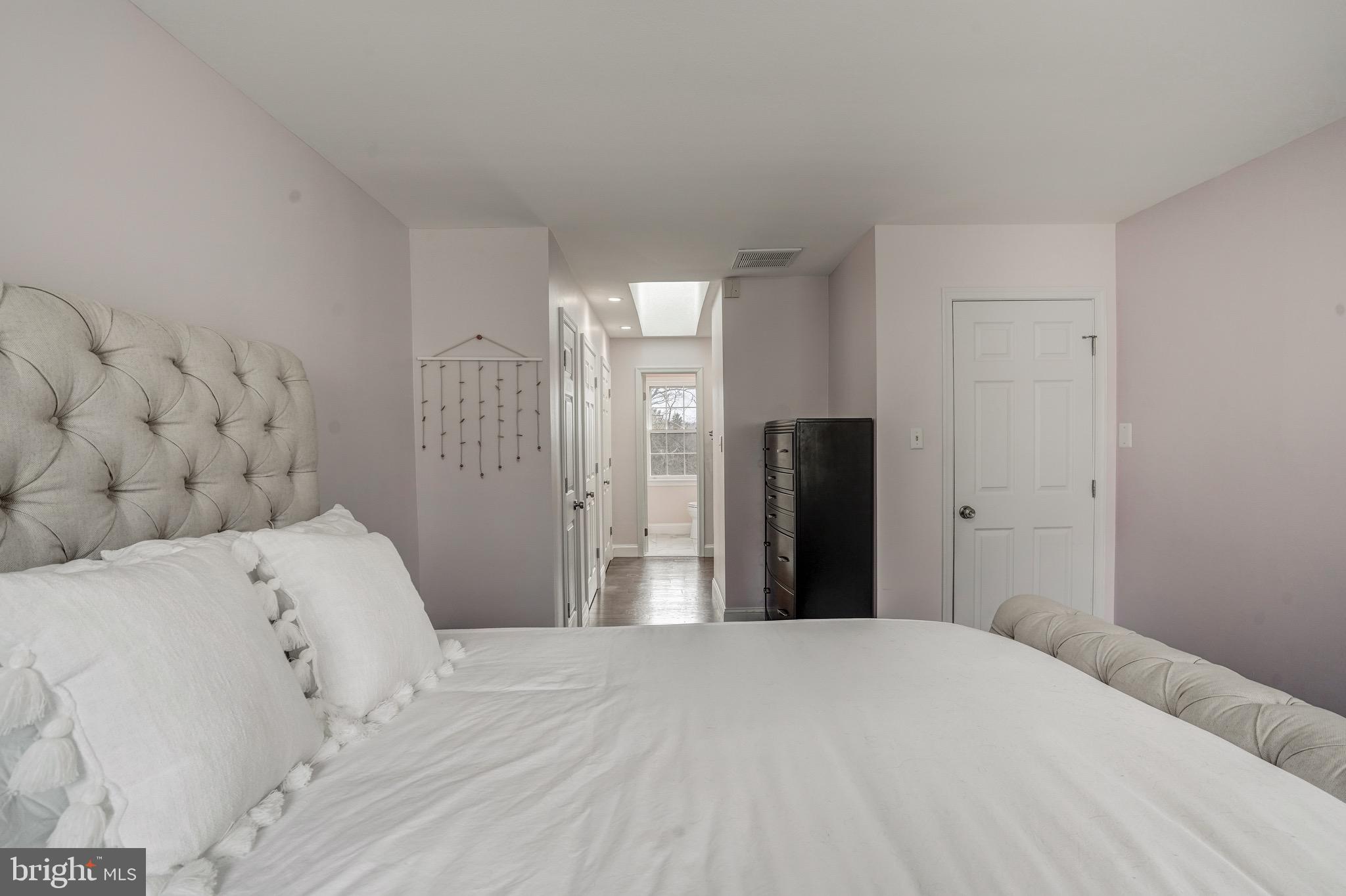 6831 Bluecurl Circle Springfield, VA 22152 - Photo 31 of 50 Bedroom 2 with en-suite bathroom and sky light