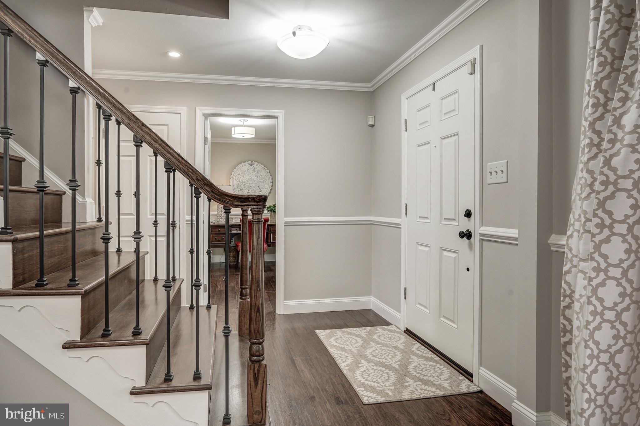 6831 Bluecurl Circle Springfield, VA 22152 - Photo 8 of 50 The main level is fitted w/ hardwood flooring