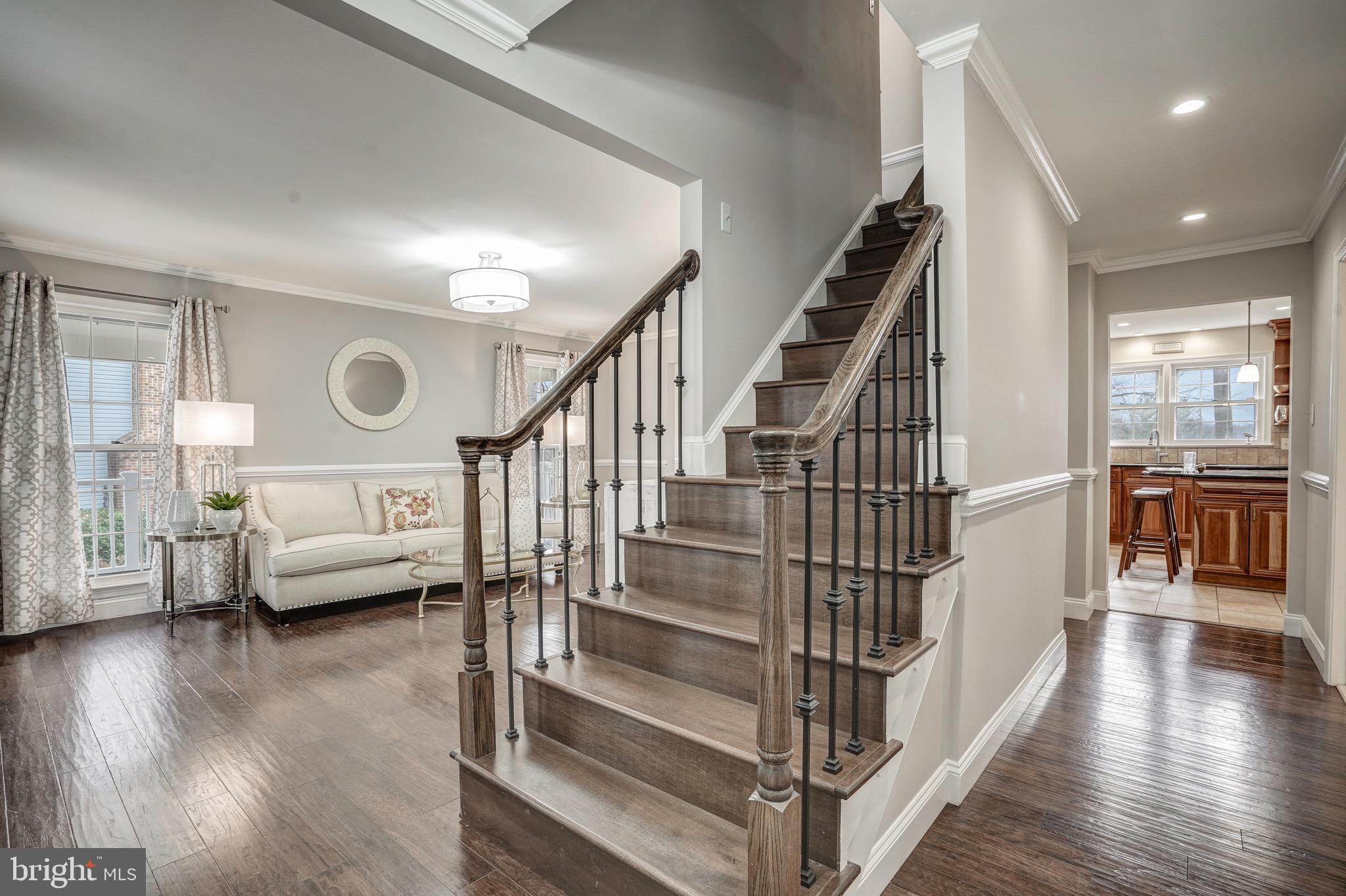 6831 Bluecurl Circle Springfield, VA 22152 - Photo 9 of 50 Elegant stairs and rails.