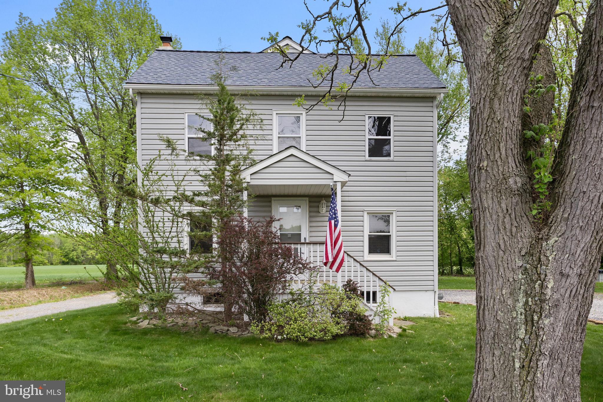3950 Crosswicks Hamilton Square Road Hamilton, NJ 08691 - Photo 1 of 41 a front view of a house with a garden