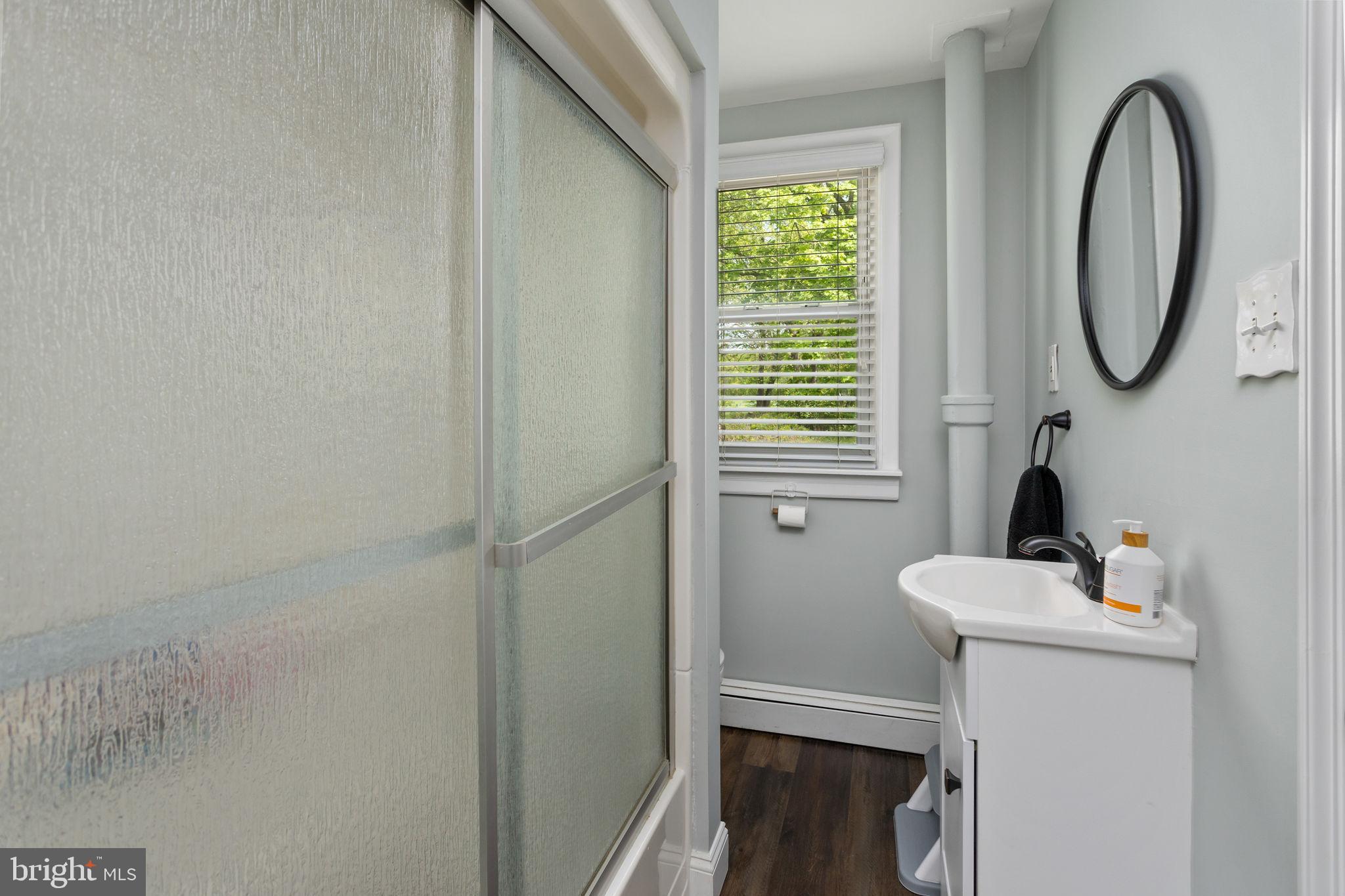 3950 Crosswicks Hamilton Square Road Hamilton, NJ 08691 - Photo 20 of 41 a bathroom with a sink and a mirror