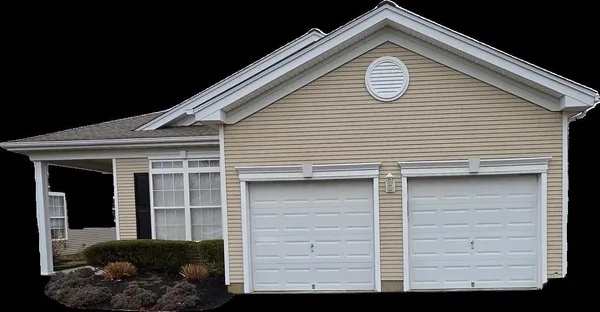 a front view of a house with a large window