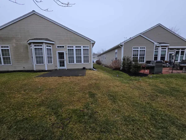 a view of a house with a big yard