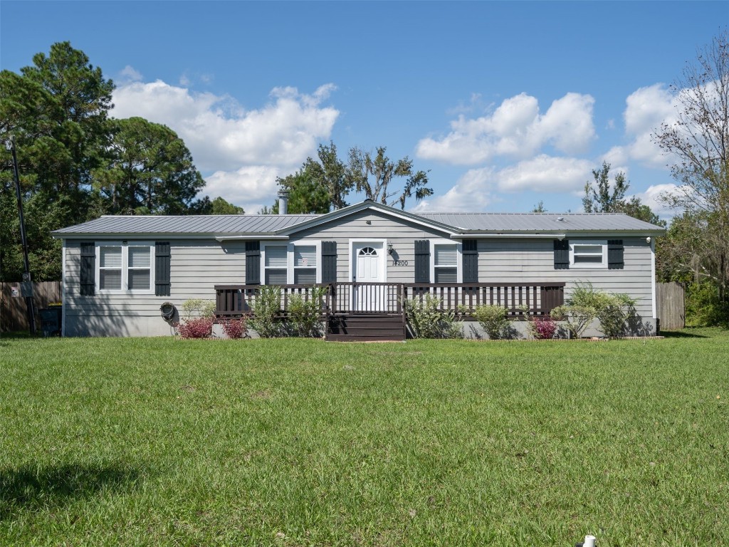 14200 Grover Road Jacksonville, FL 32226 - Photo 1 of 26 Beautifully landscaped frontal view
