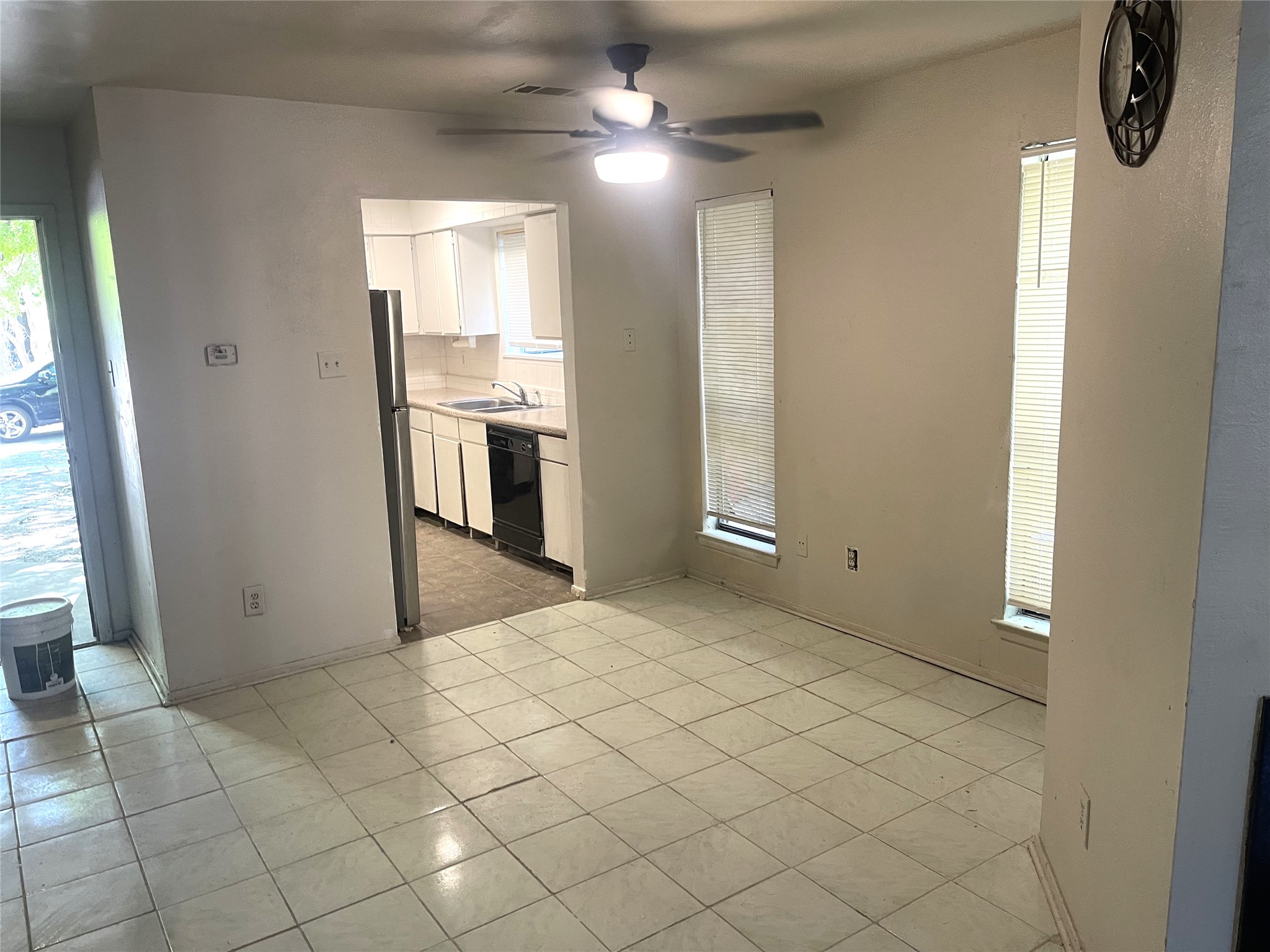 1902 West Loop, Unit A1 Austin, TX 78758 - Photo 16 of 22 a view of a kitchen with cabinet and a fireplace