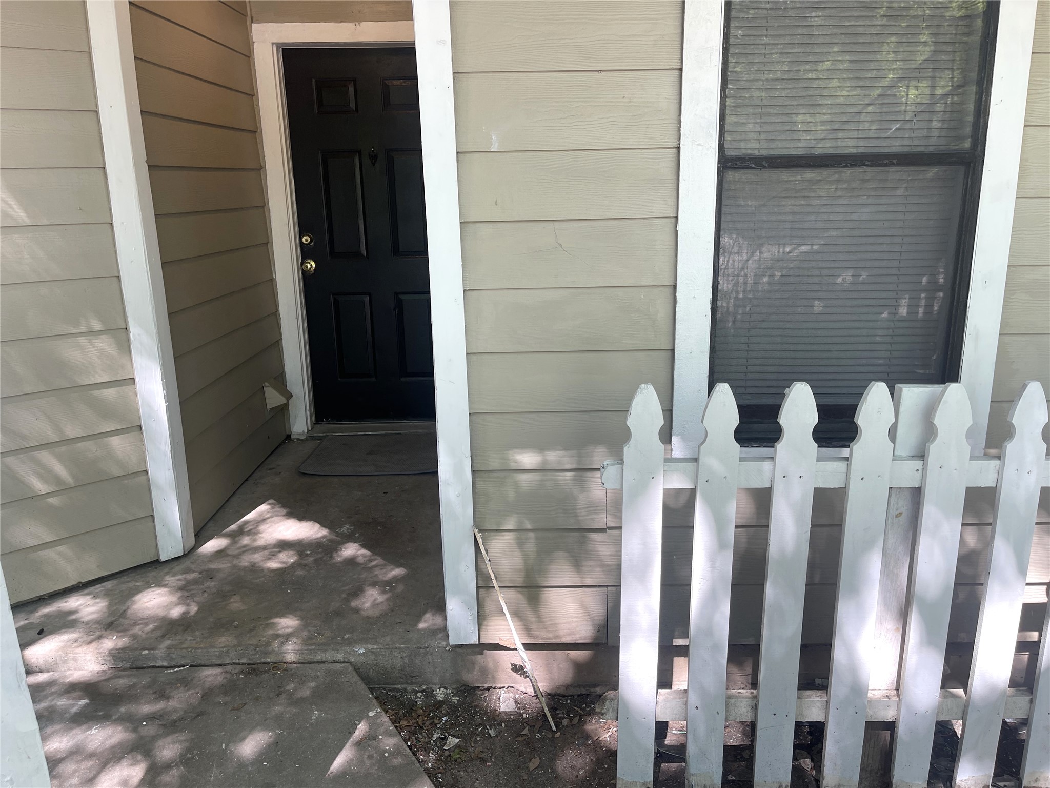 1902 West Loop, Unit A1 Austin, TX 78758 - Photo 22 of 22 a view of wooden door