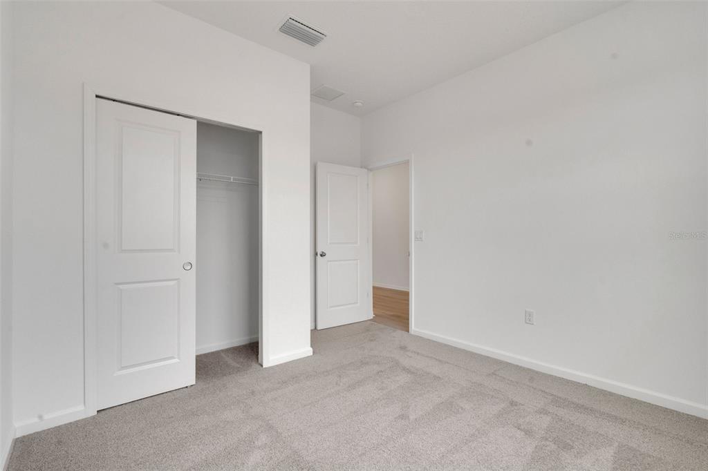 2878 Supermarine Road Tavares, FL 32778 - Photo 13 of 23 a view of an empty room