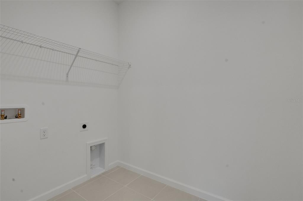 2878 Supermarine Road Tavares, FL 32778 - Photo 14 of 23 a view of a closet