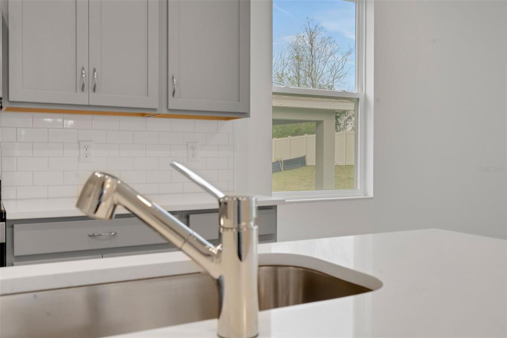 2878 Supermarine Road Tavares, FL 32778 - Photo 19 of 23 a close view of sink and tap