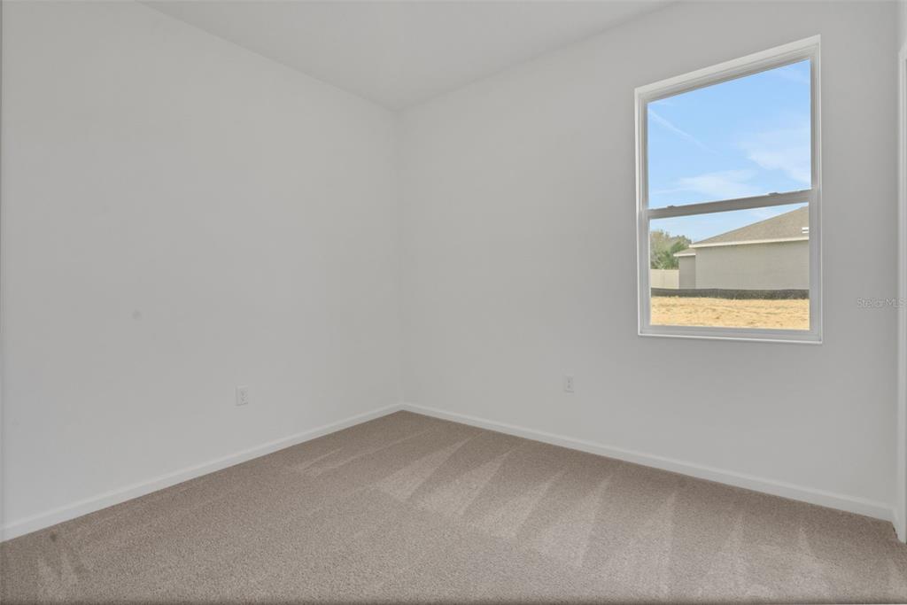 2878 Supermarine Road Tavares, FL 32778 - Photo 23 of 23 a view of an empty room