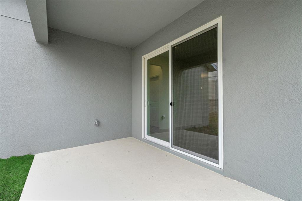 2878 Supermarine Road Tavares, FL 32778 - Photo 8 of 23 a view of an empty room with a window