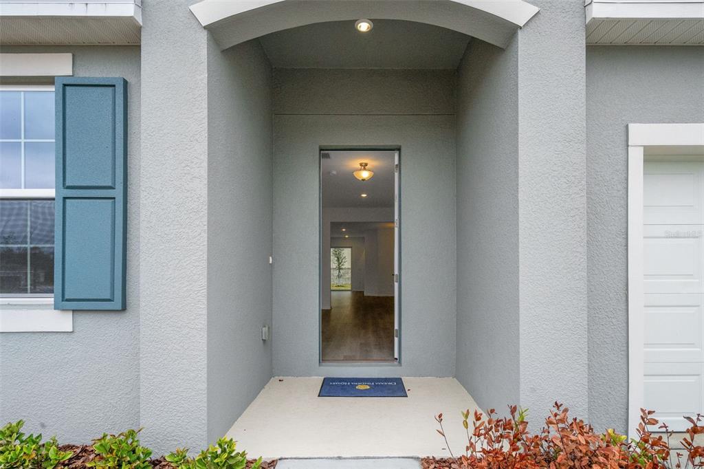 2878 Supermarine Road Tavares, FL 32778 - Photo 9 of 23 a view of an entryway of a house